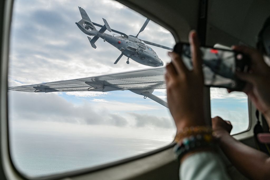 south-china-sea-china-philippines-helicopter-plane.jpg
