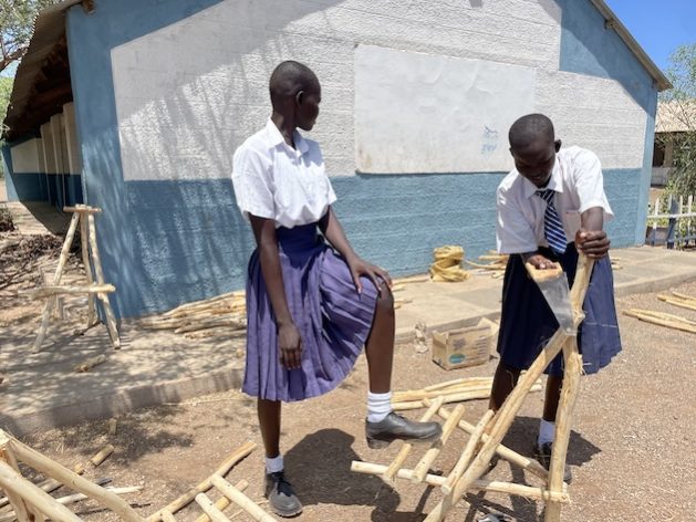 Magdalene-Ngimoe-and-Char-Tito-leaners-at-Kakuma-Arid-Zone-Secondary-School-making-chairs-from-mathenge-wood.-Credit-Farai-Shawn-Matiashe-629x472.jpeg
